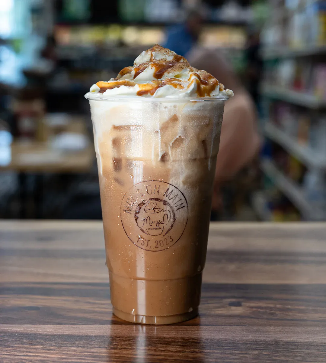 An iced latte with caramel drizzle from Mugs at Schmidt’s, the café inside Schmidt’s Country Market in Quogue, Long Island