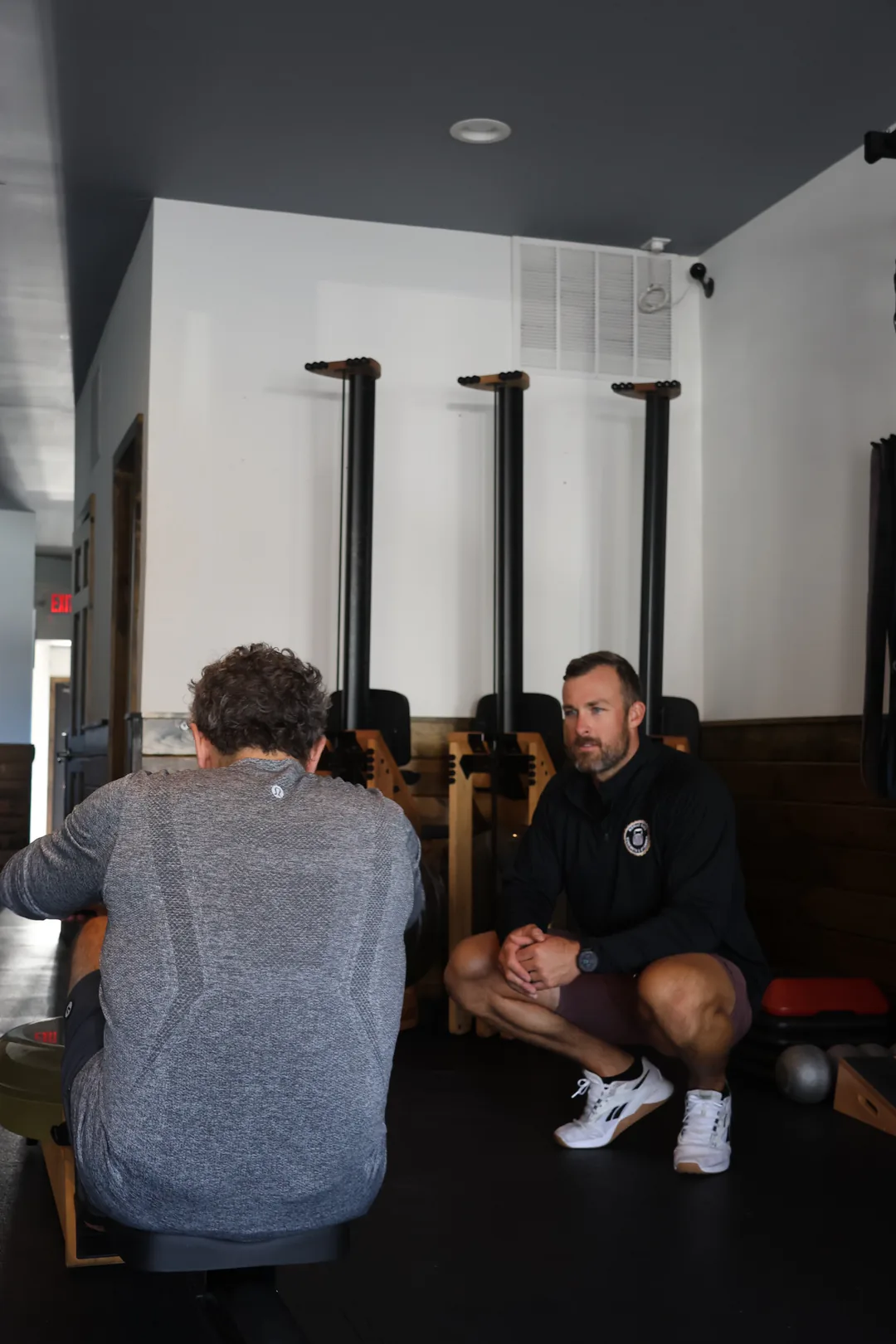 A one-on-one coaching session inside Nomad East Fitness, the private gym on Montauk Highway in East Quogue, Long Island